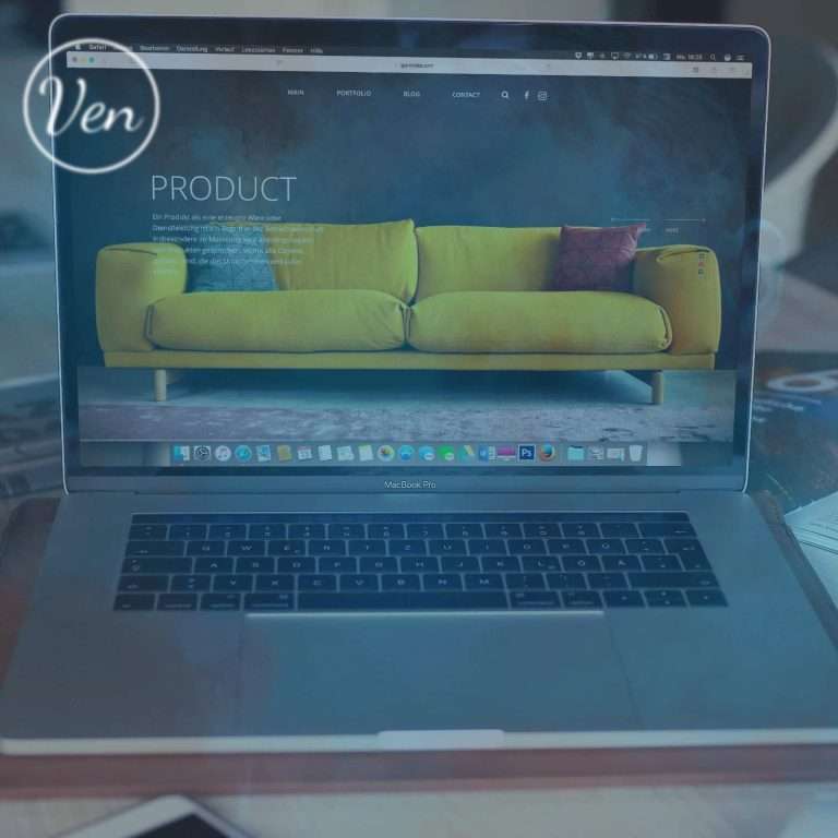 A picture of a couch on a Macbook pro overlaid in a blue fog style smoke